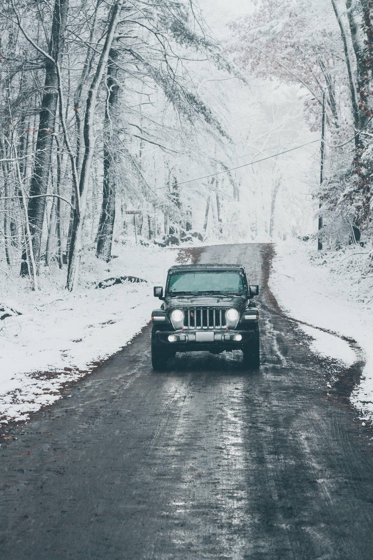 Download Black Jeep Snowy Forest Wallpaper