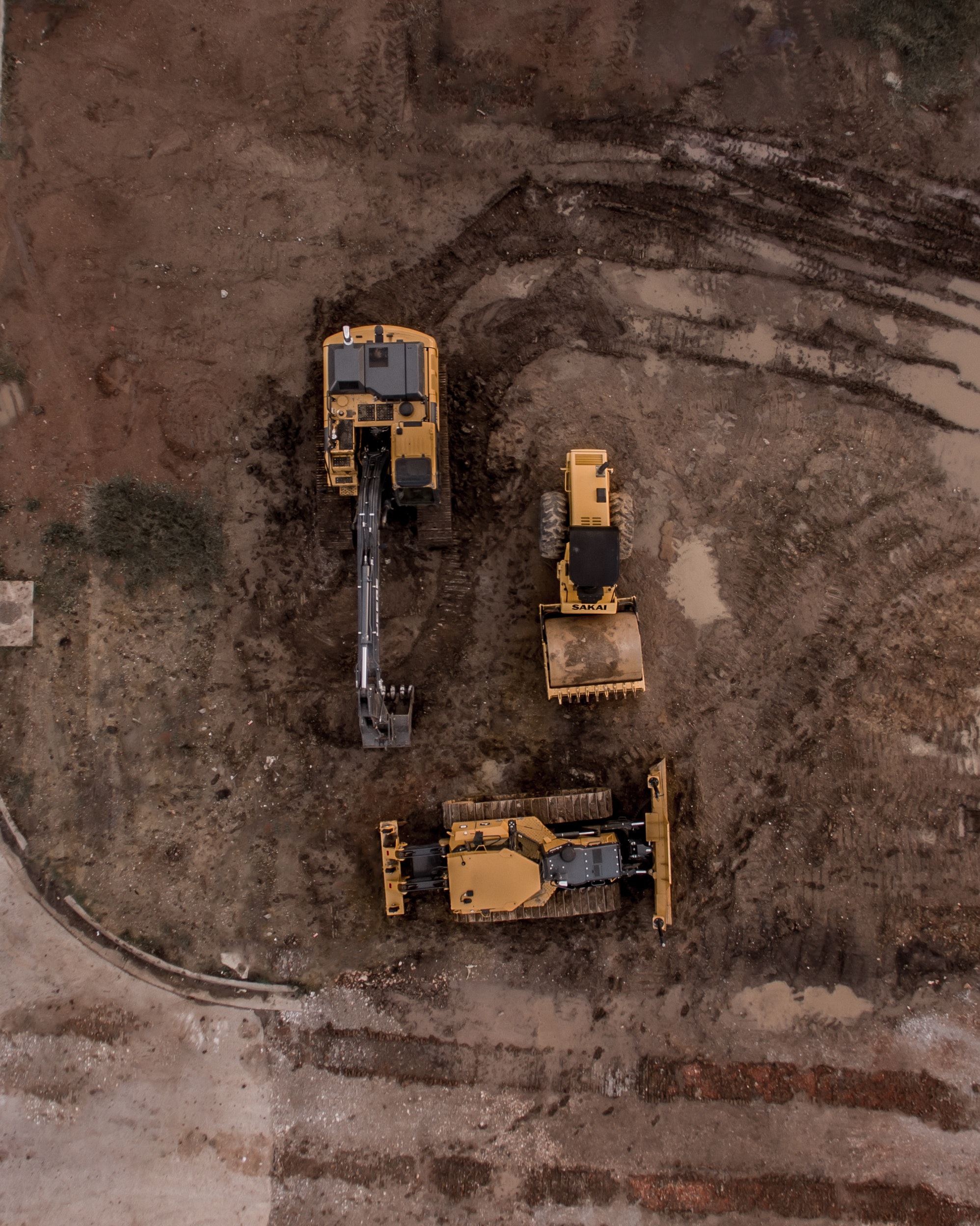 Aerial Photo Of Excavator, Road Roller, And Bulldozer · Free