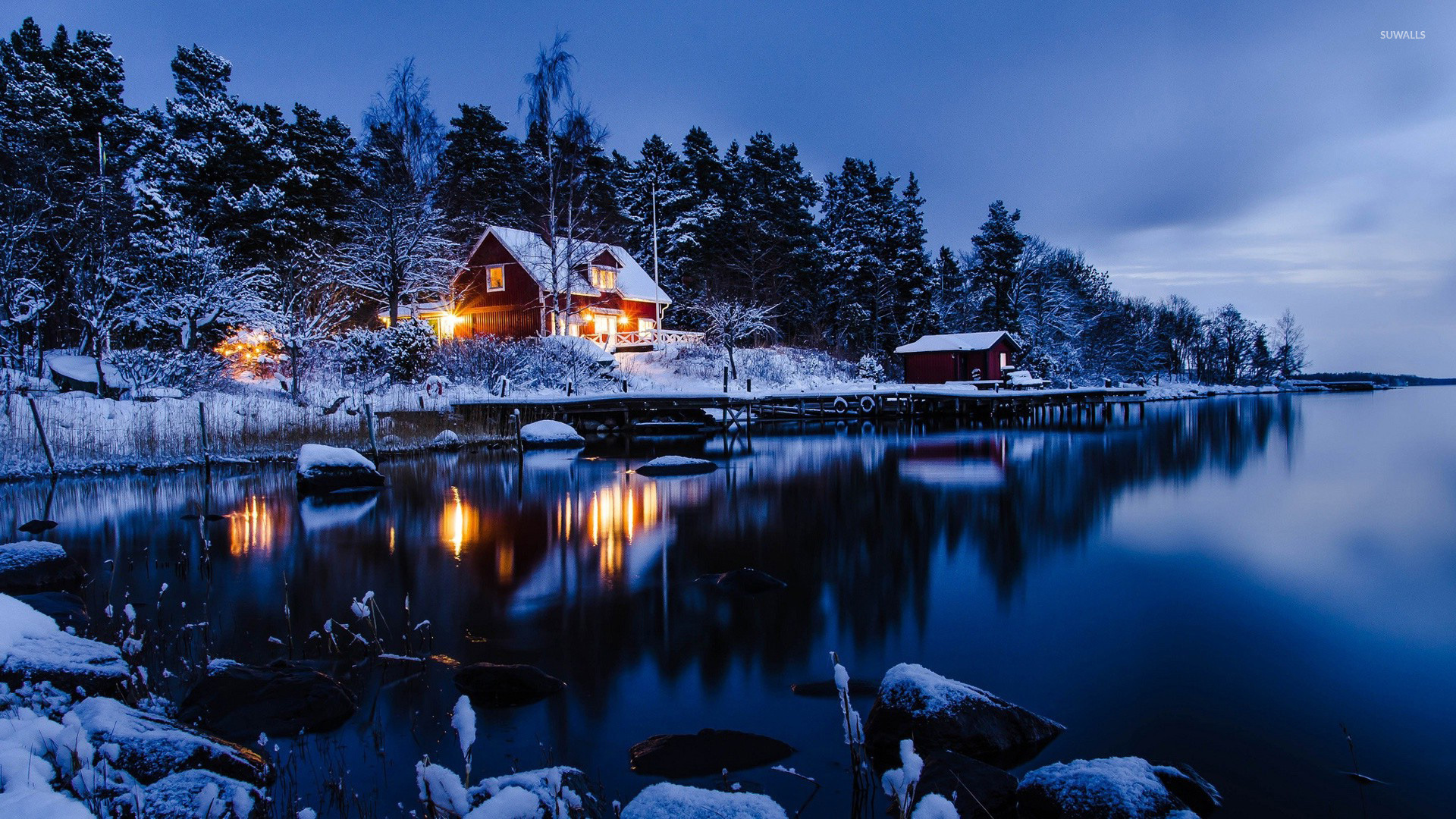 Lakeside winter cabin wallpaper