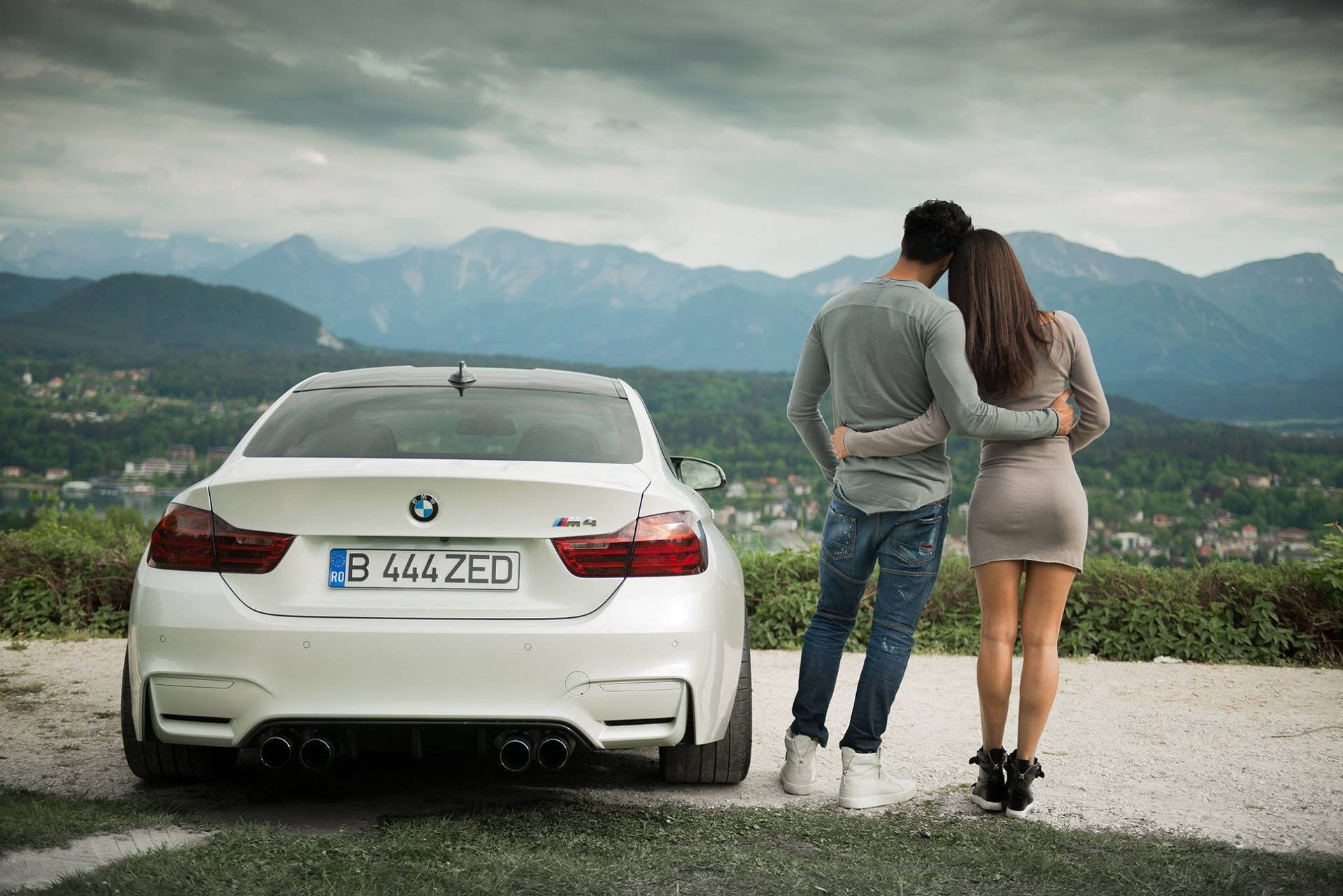 Download Couple With White BMW M4 Wallpaper