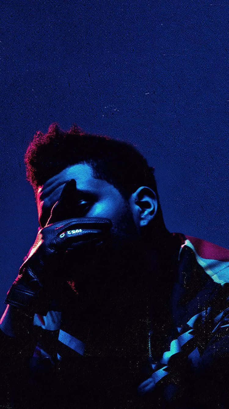 Download Sultry portrait of The Weeknd on stage