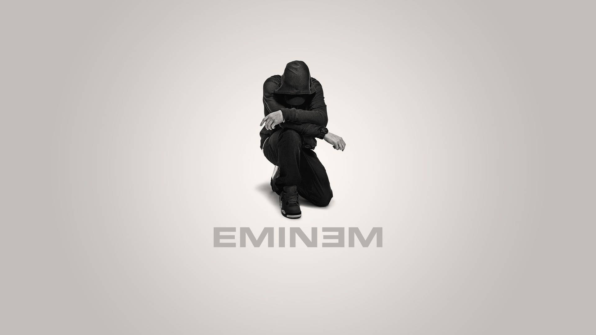 Download Kneeling Eminem In Black Wallpaper