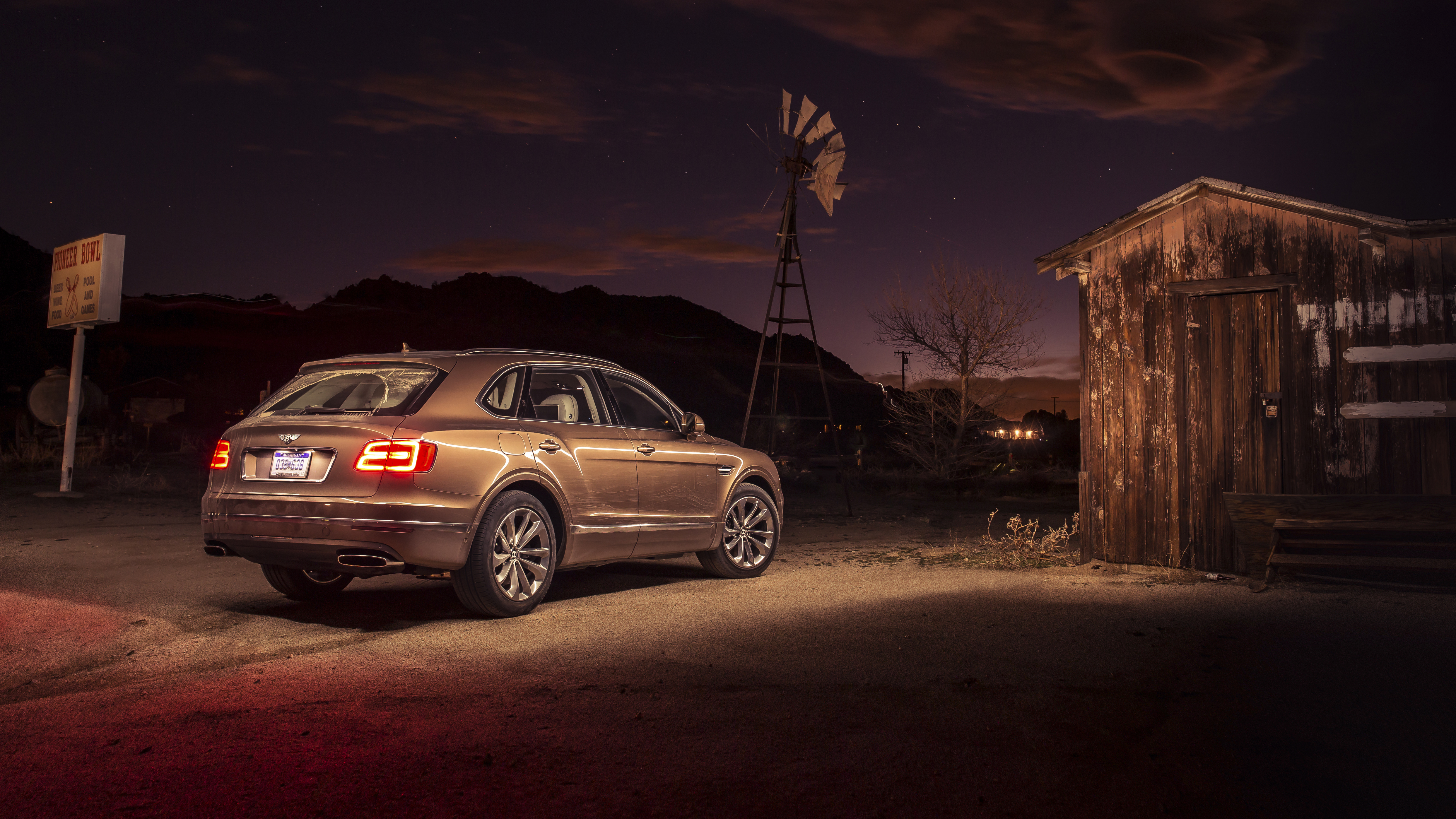 gold mining in a Bentley Bentayga