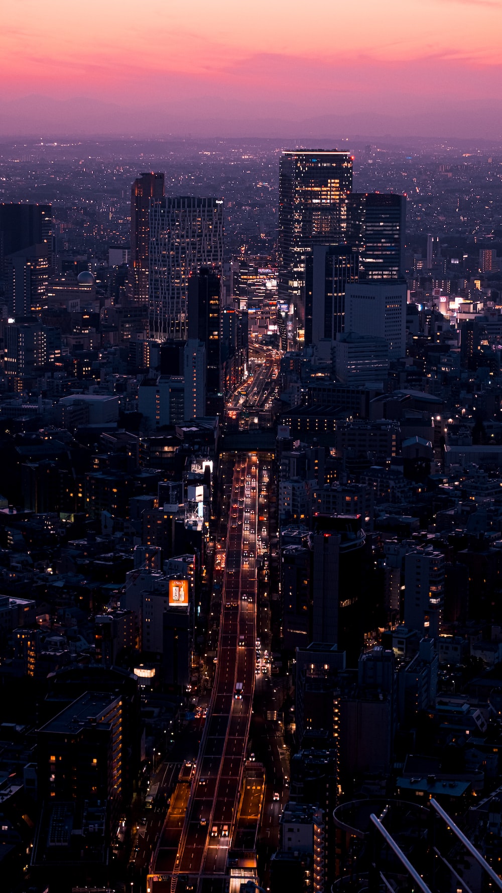 Aerial view of city buildings during night time photo