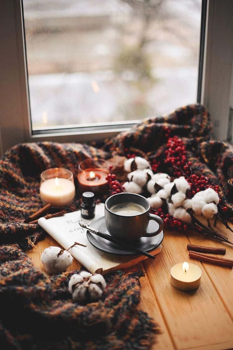 Download A cozy moment with a cup of tea and your iPhone Wallpaper