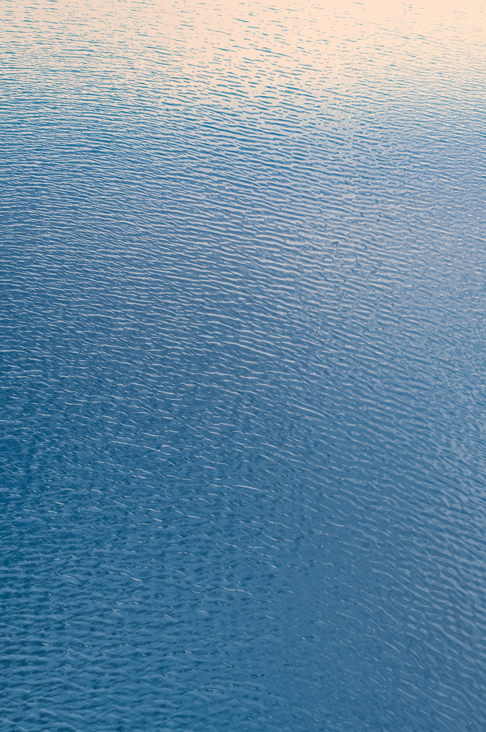 Calm lake water background texture