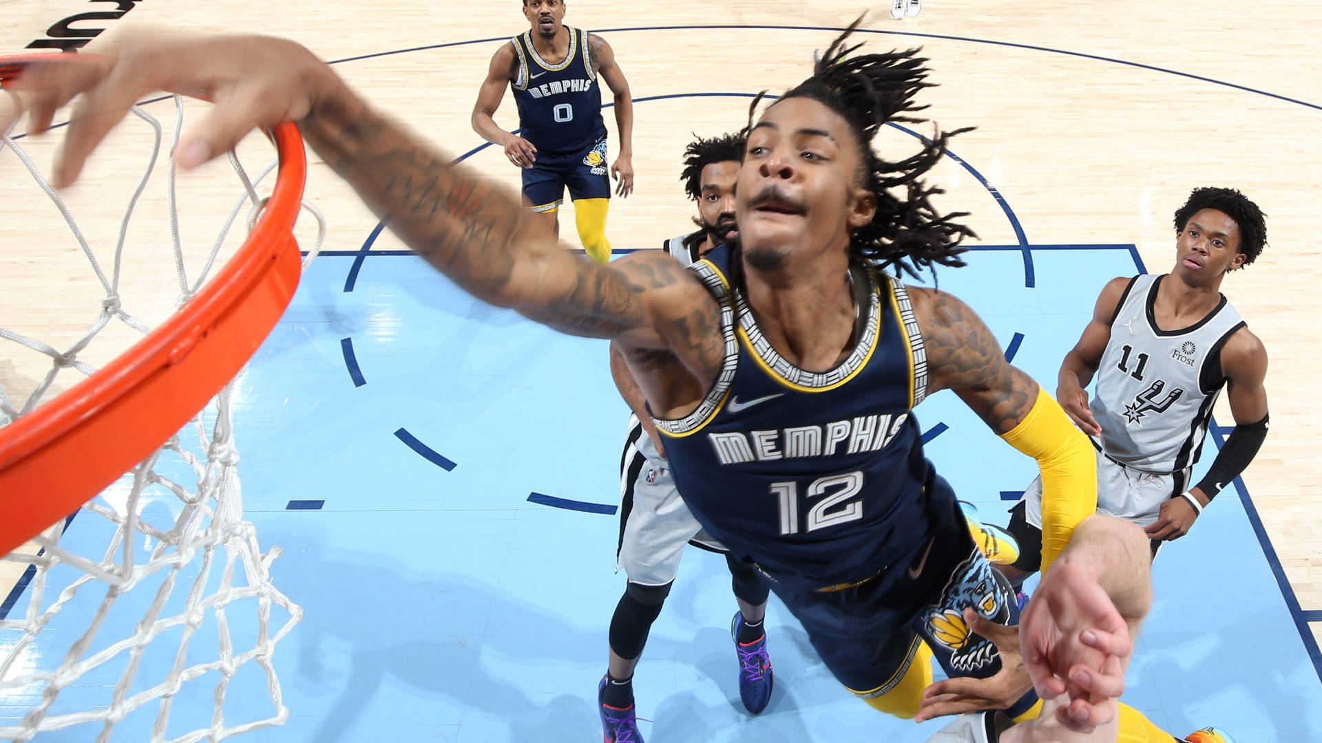 Download Ja Morant Dunk Against Spurs Wallpaper