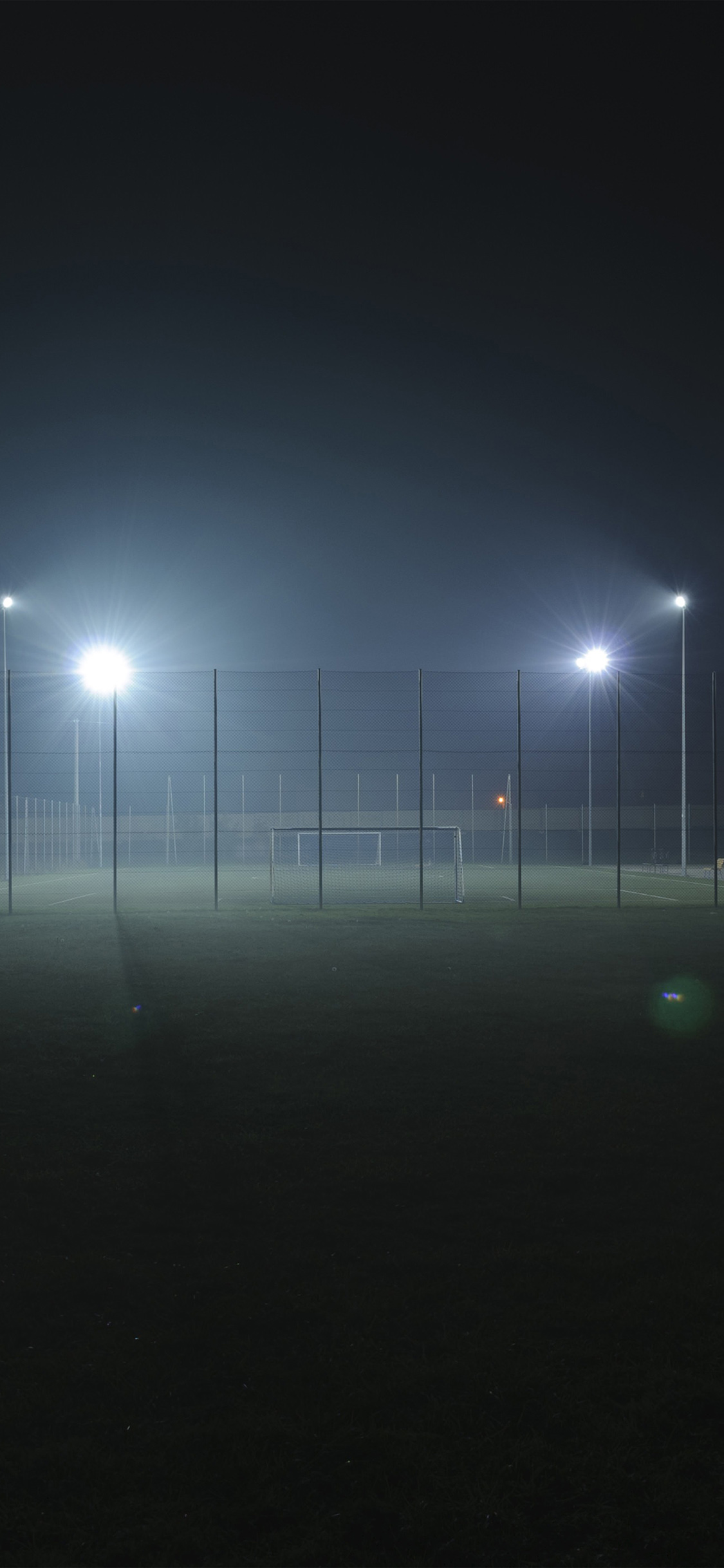 Soccer Field City Night Light Dark Wallpaper