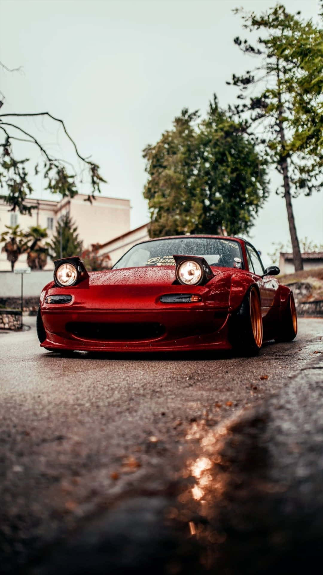 Wet Mazda MX 5 Miata Red Sports Car