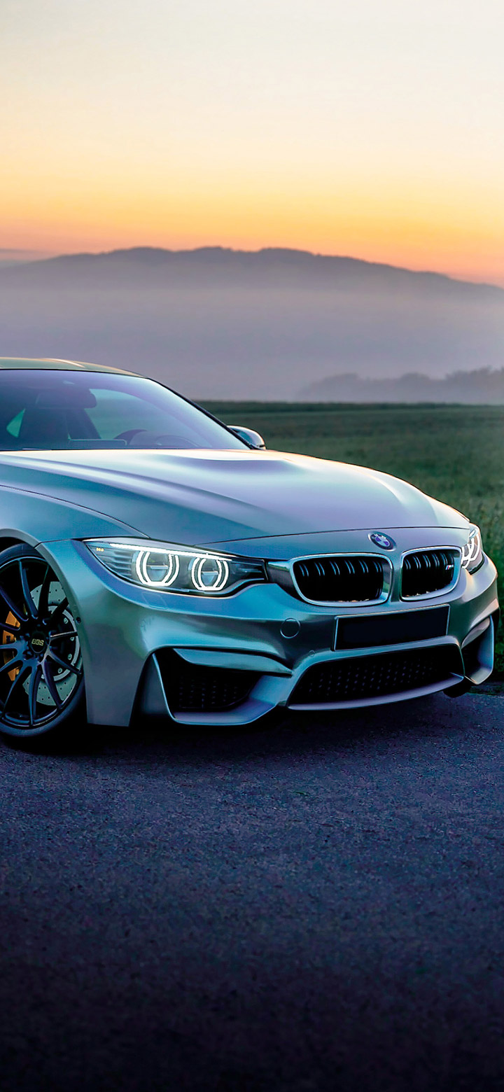 Gray BMW On Asphalt Road 4K Phone Wallpaper