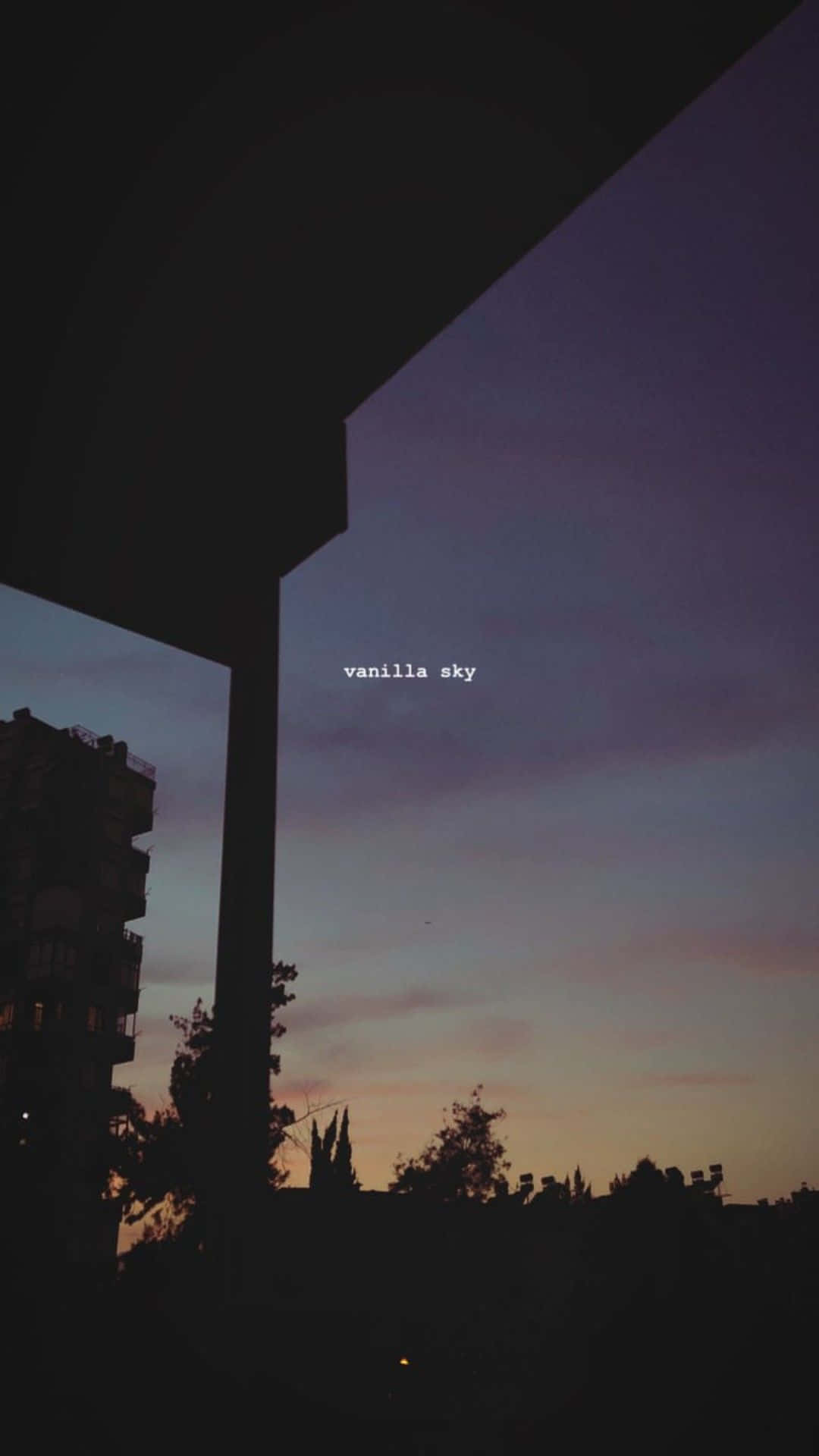 Download A Silhouette Of A Building With The Words'you're The One' Wallpaper