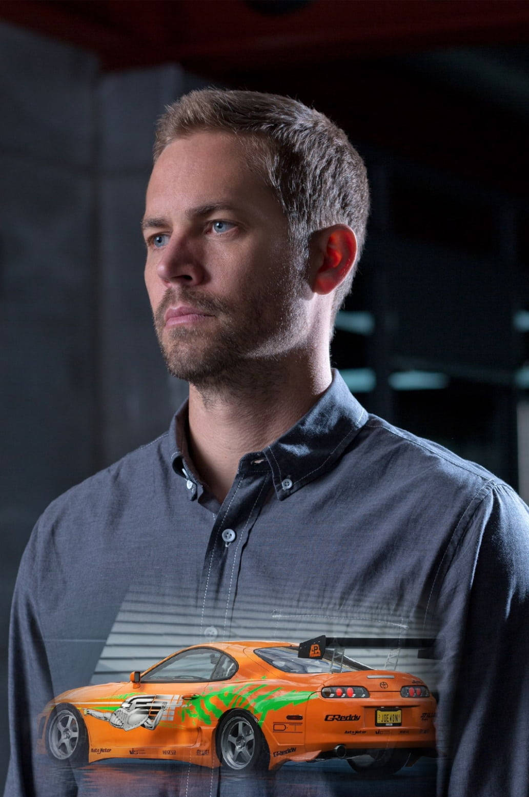 Download Paul Walker And Orange Race Car Wallpaper