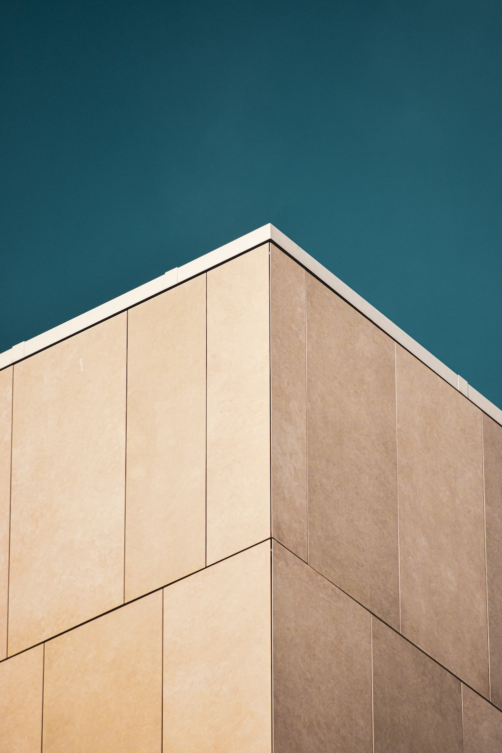 A building with a clock on the side of it photo