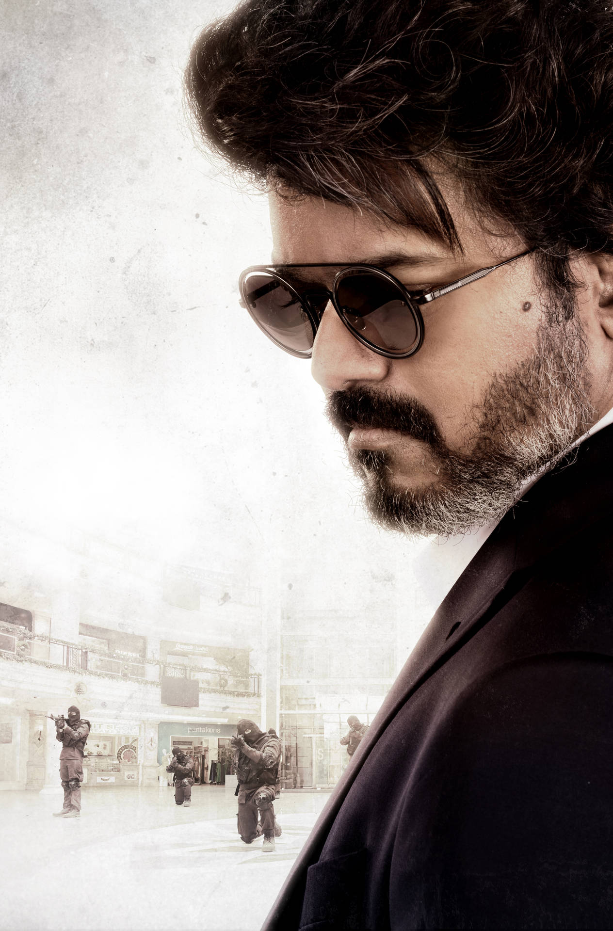 Download Dynamic Beast Vijay Standing Tall Over Armed Men Wallpaper