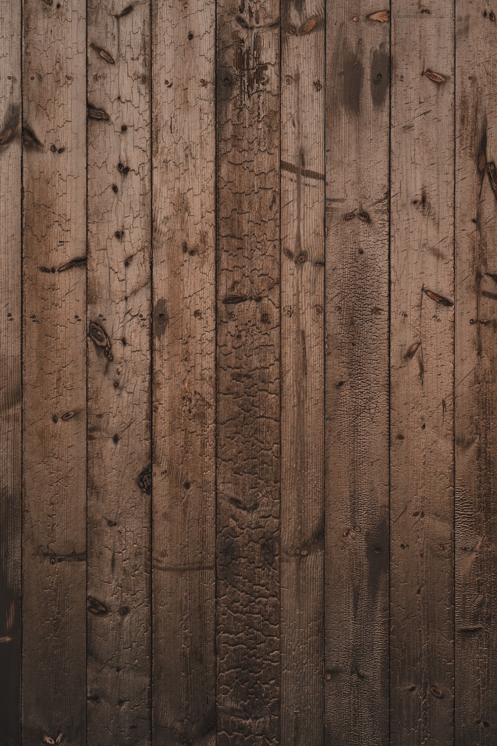 Brown wooden plank in close up photography photo