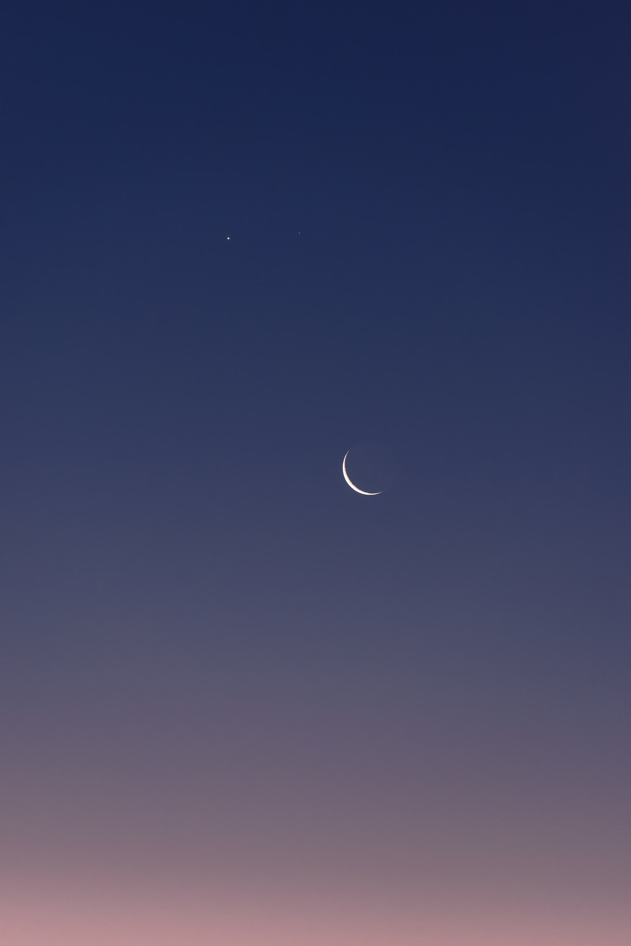 Venus and Mars above the crescent Moon