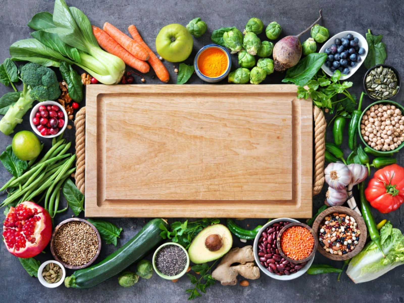 Download A Cutting Board With Vegetables And Fruits On It