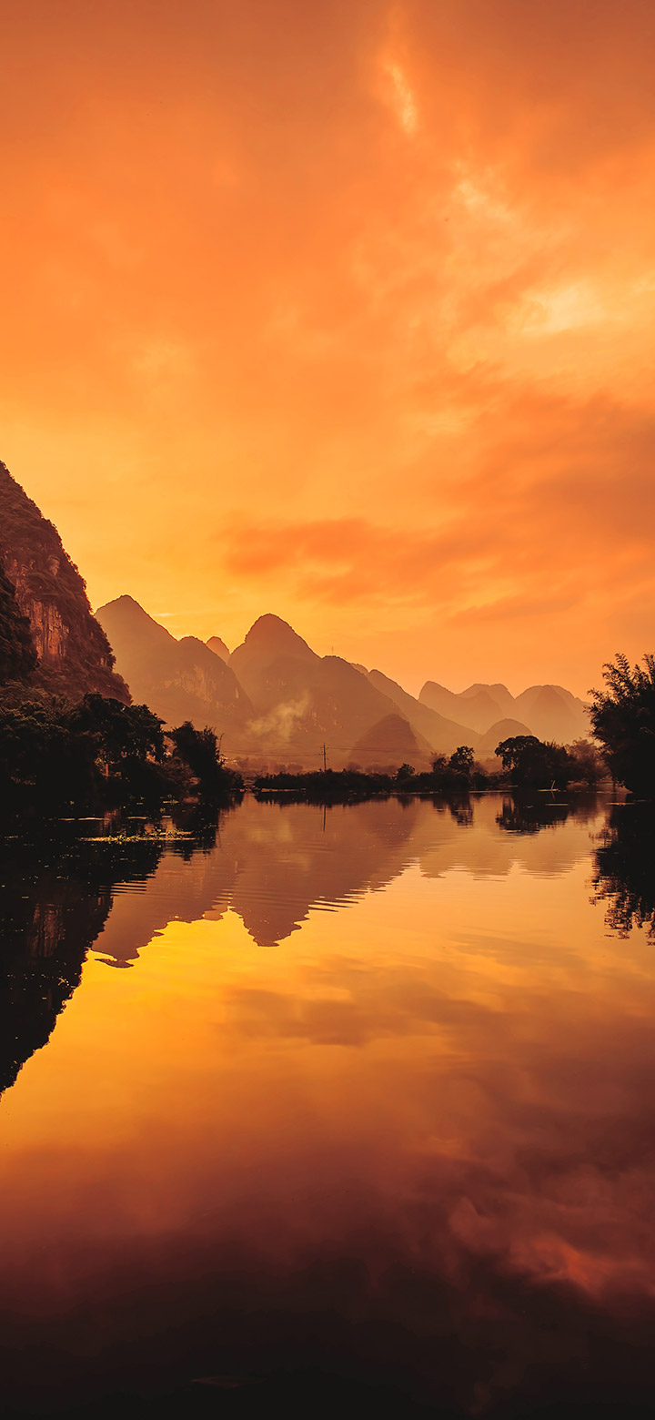 Brown Lake Surrounded By Mountains 4K