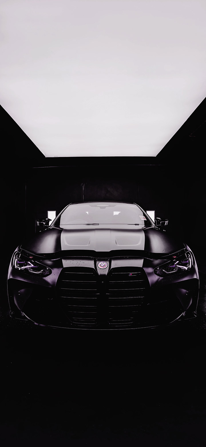 Black Bmw In A Dark Room 4K Phone Wallpaper