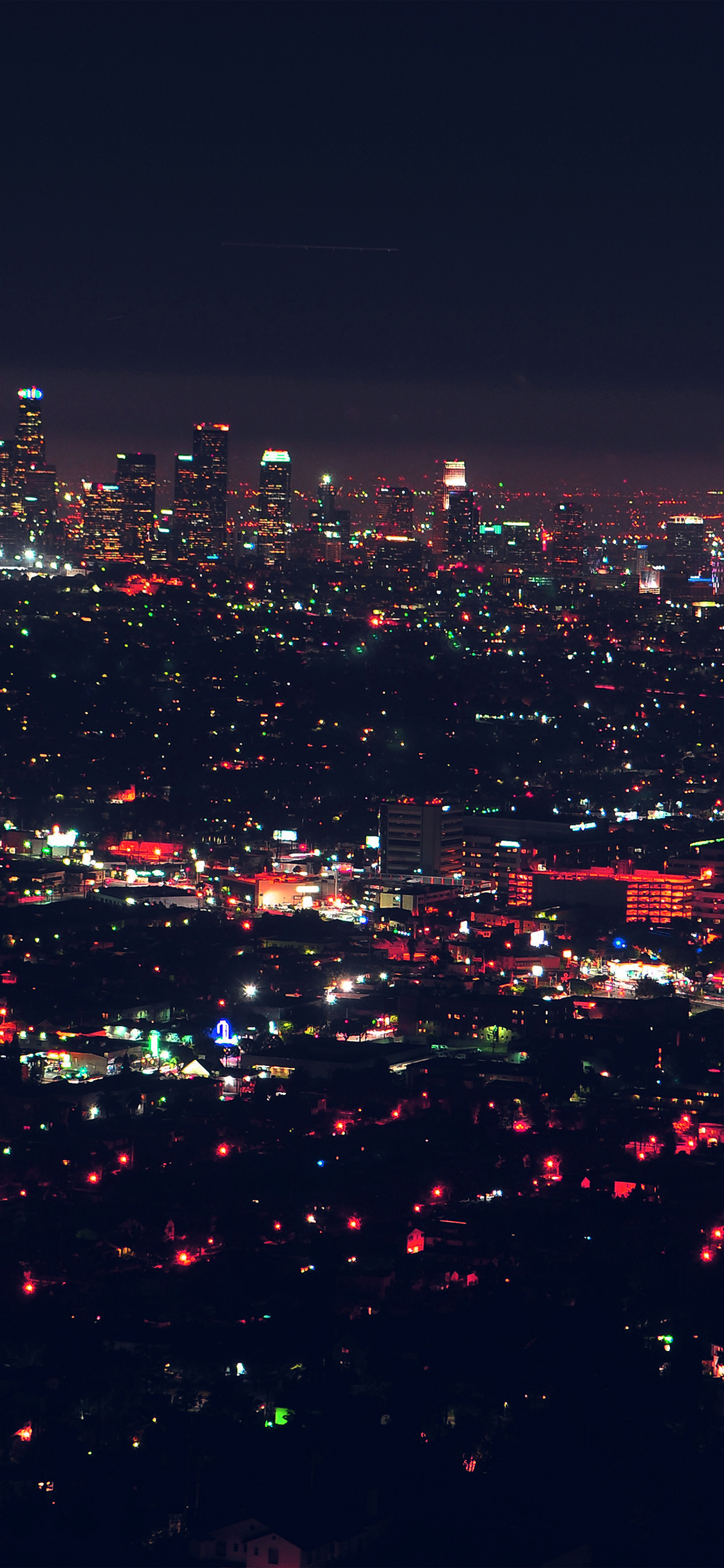 iPhone X wallpaper. city view night light red