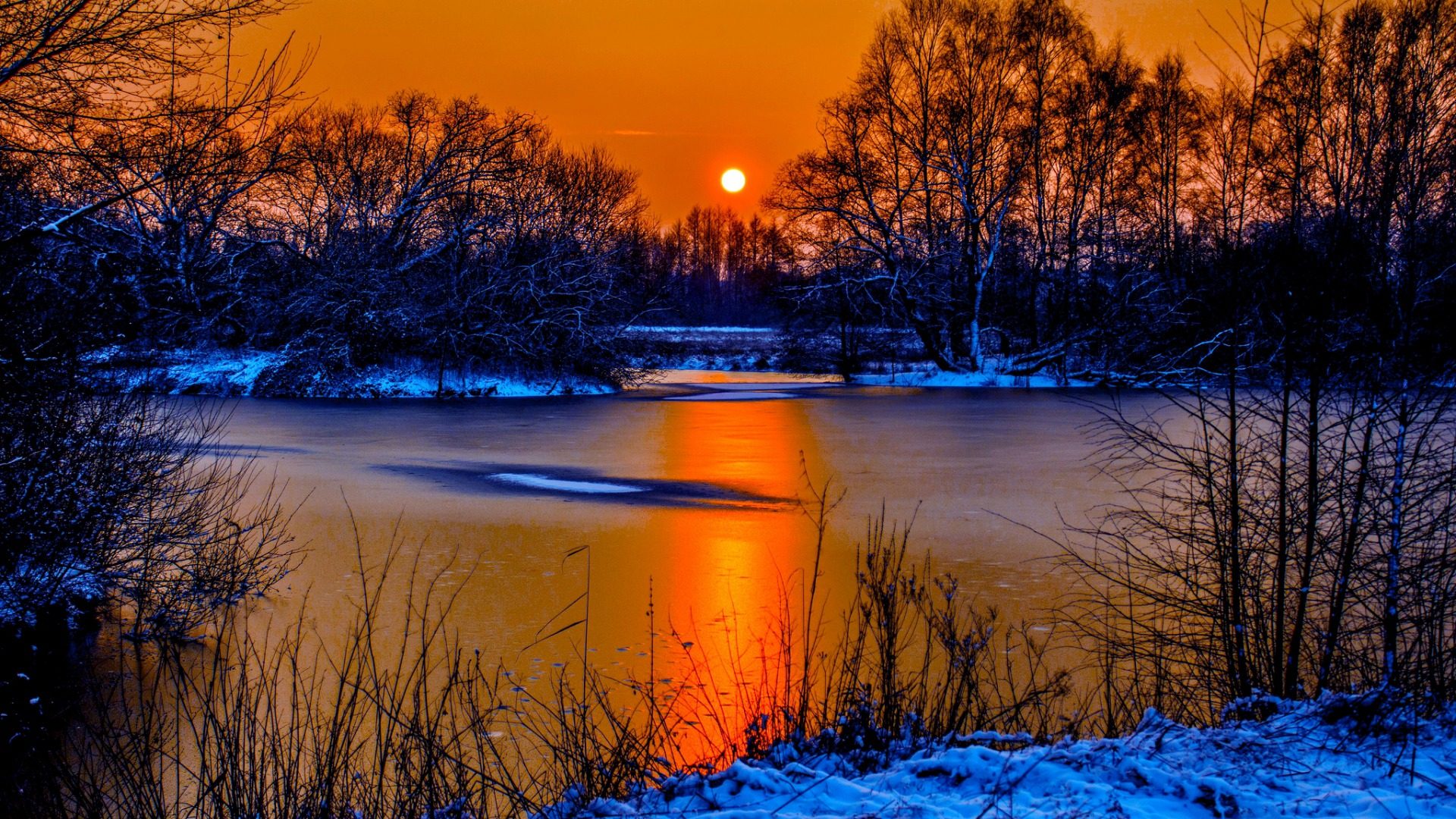 Sunset In Winter Snow River Coast