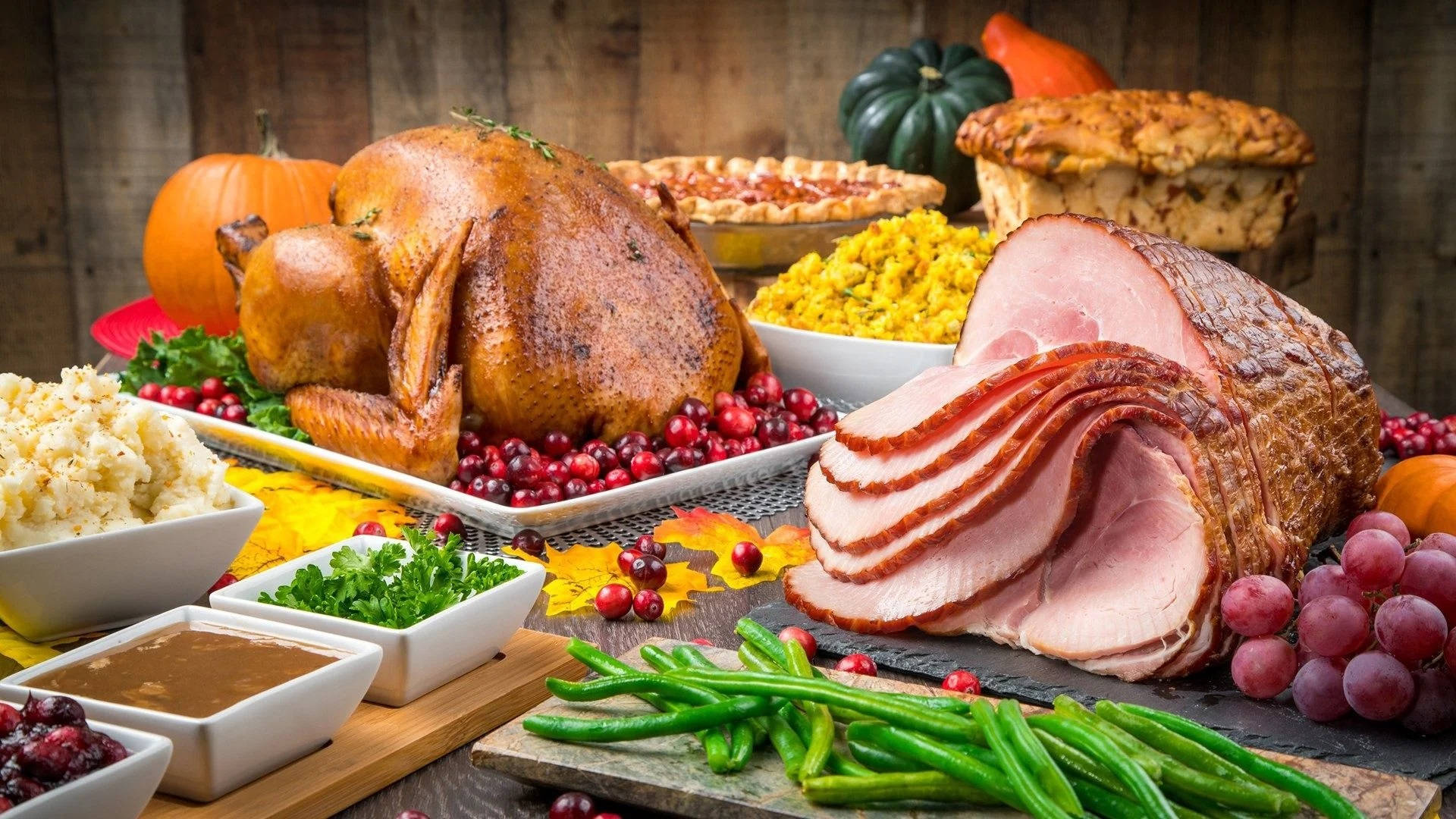 Download A Sumptuous Feast of Ham and Roasted Turkey for Dinner Wallpaper