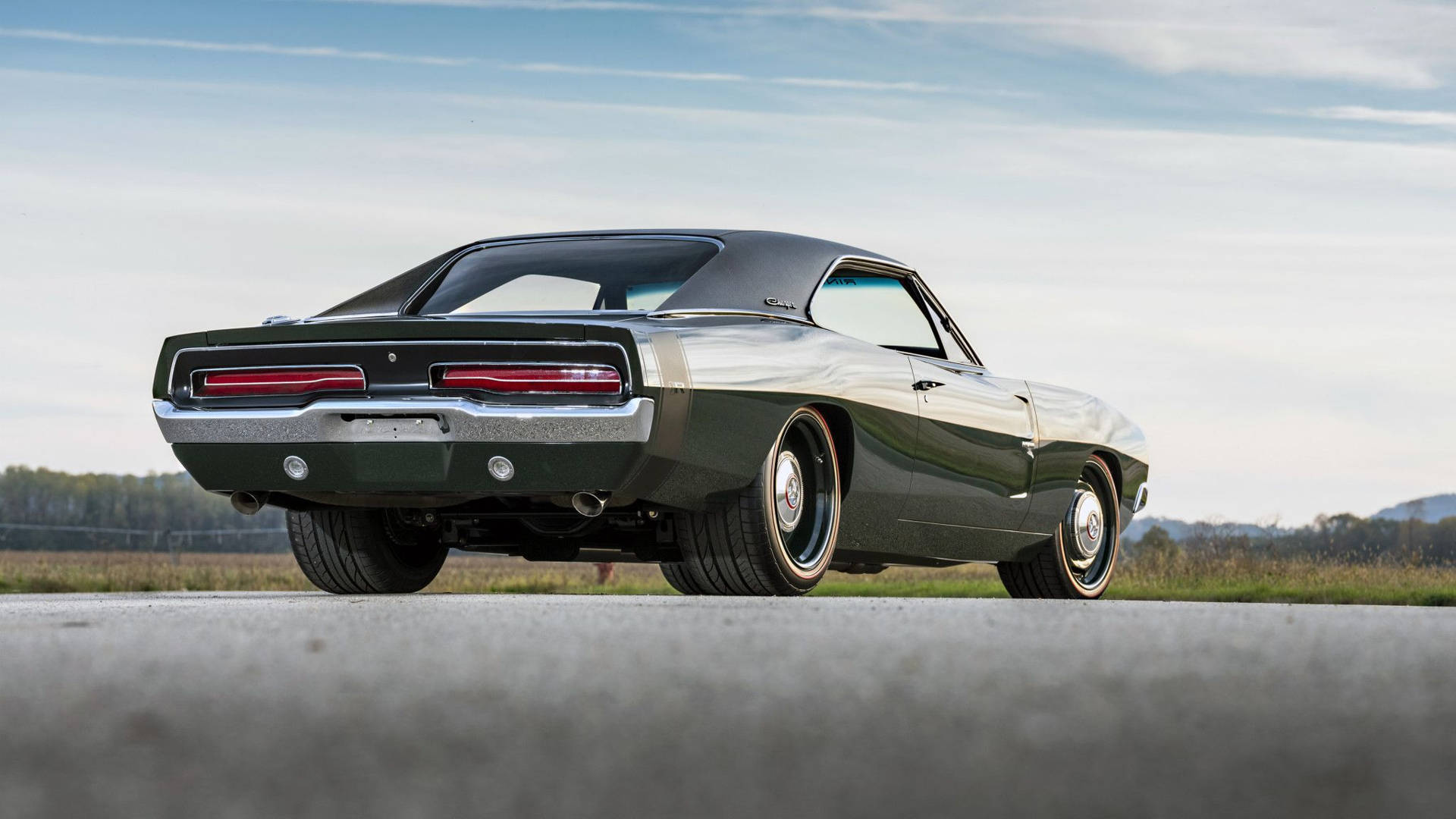 Download Sleek Black 1969 Dodge Charger Wallpaper