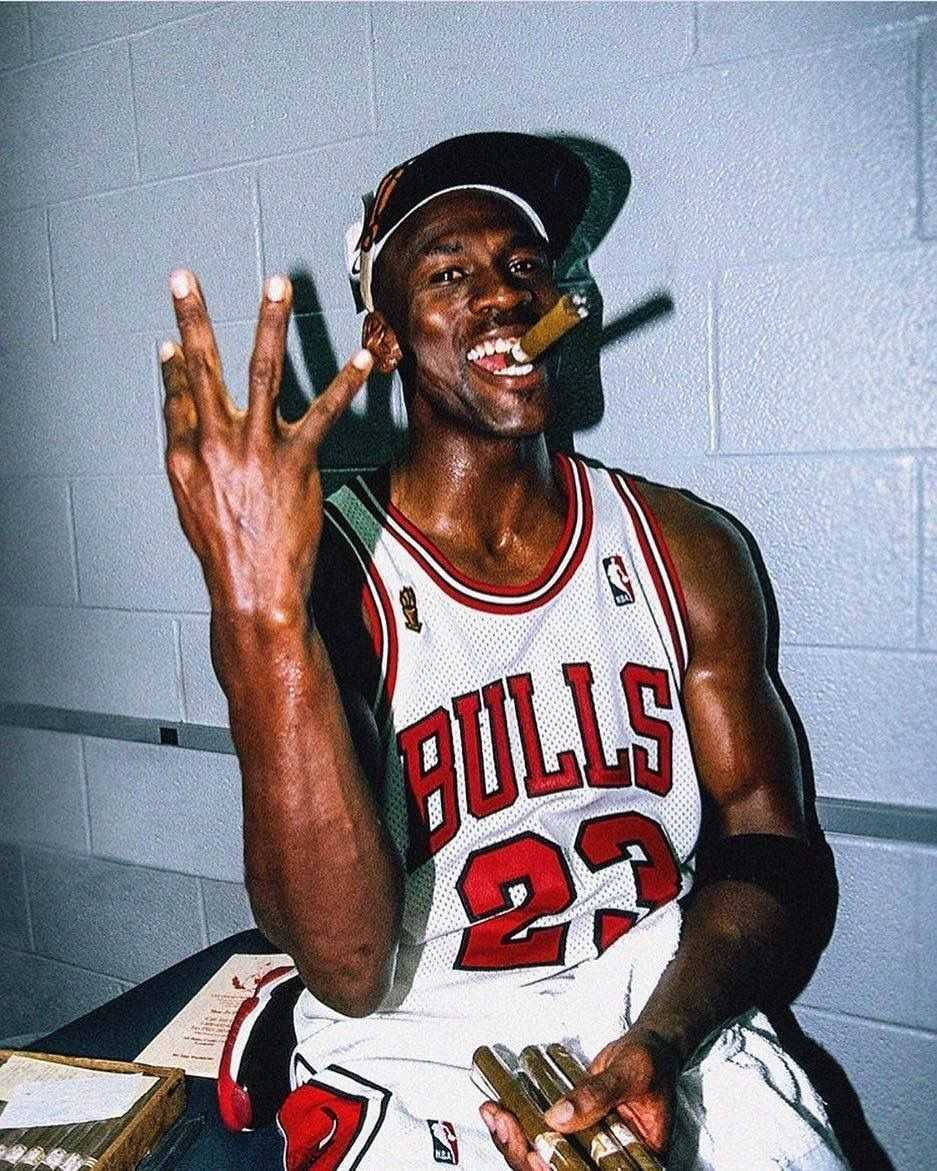 Download Cool Michael Jordan Smoking A Cigar Wallpaper