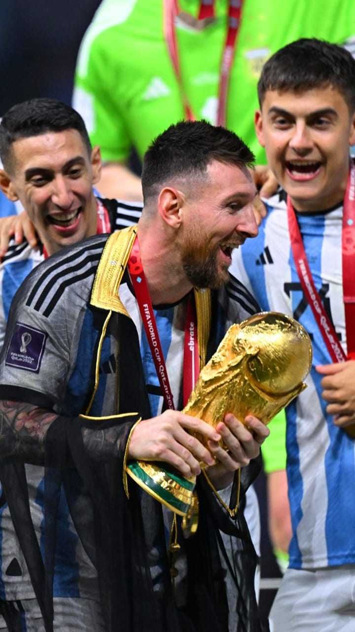 Messi Holding World Cup Wallpaper Discover more Leo Messi, Lionel Messi, Messi, Messi Argentina, Messi World Cup wallpaper.. Lionel messi, Messi, World cup