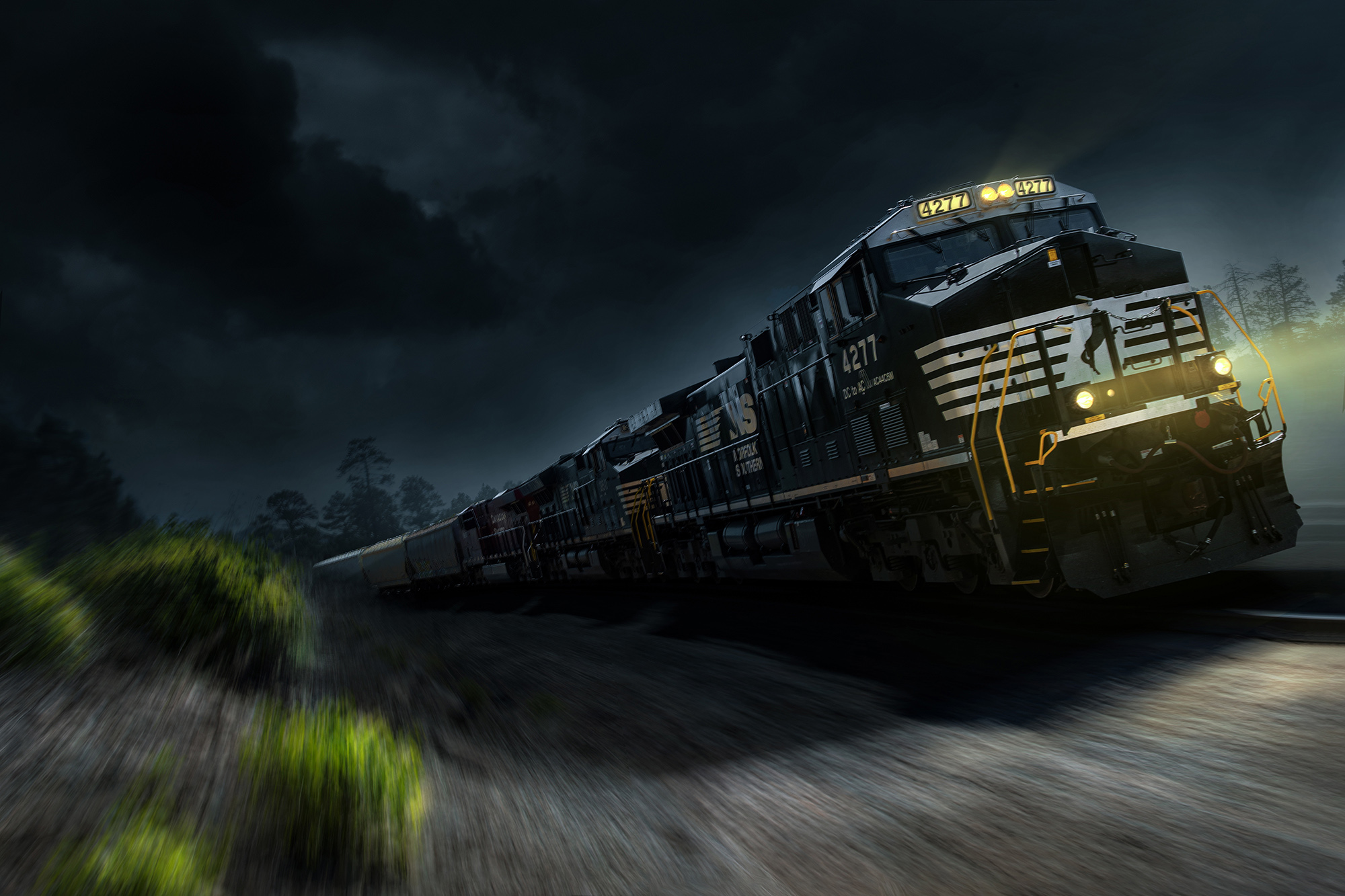 Blair Bunting all the trains I have photographed, this is the first Norfolk Southern in the series. Dark train on a dark sky