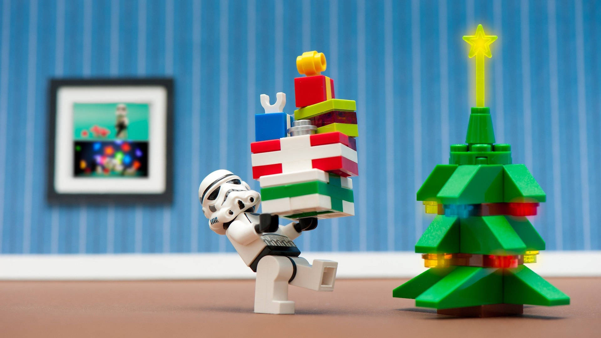 Download A Lego Stormtrooper Carrying A Christmas Tree Wallpaper