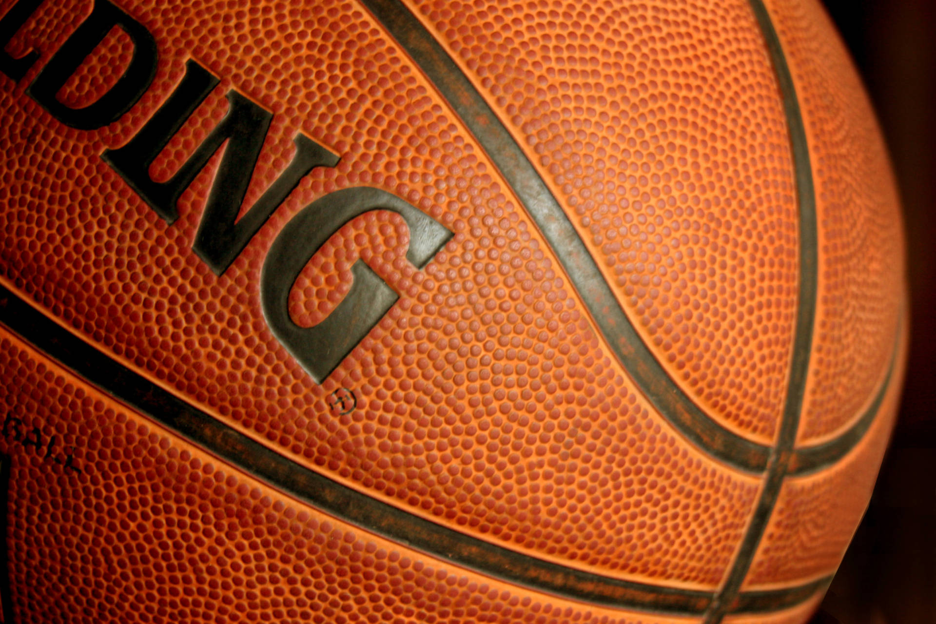 Download Grip and Spin The Spalding Basketball Wallpaper