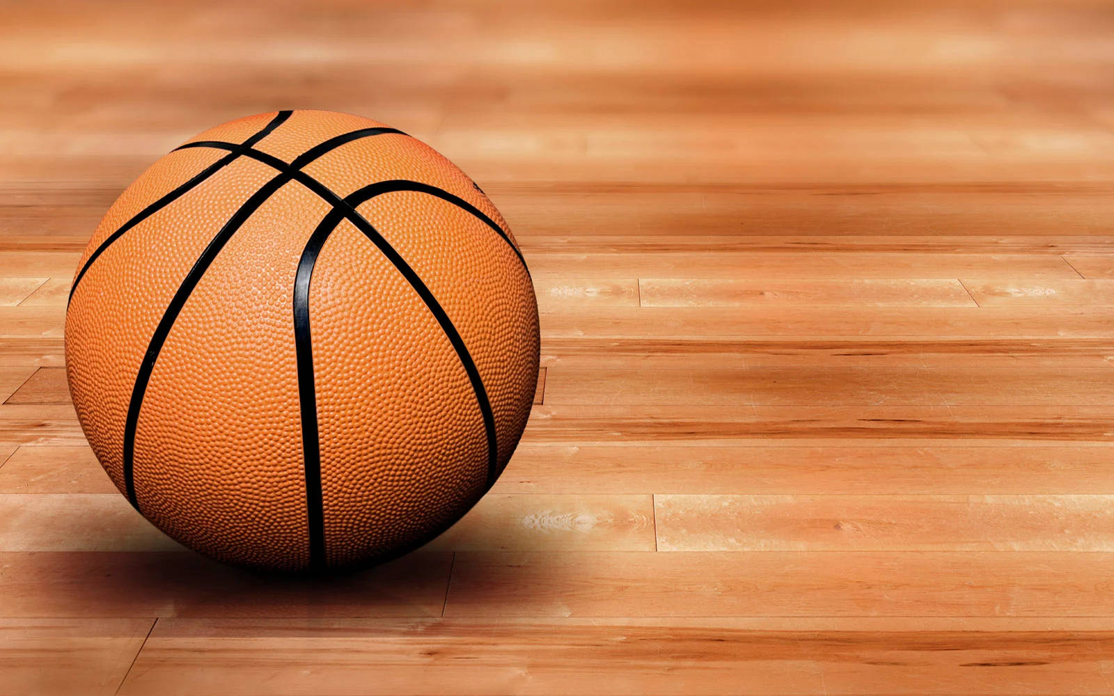Download HD Basketball Ball On Wooden Floor Wallpaper