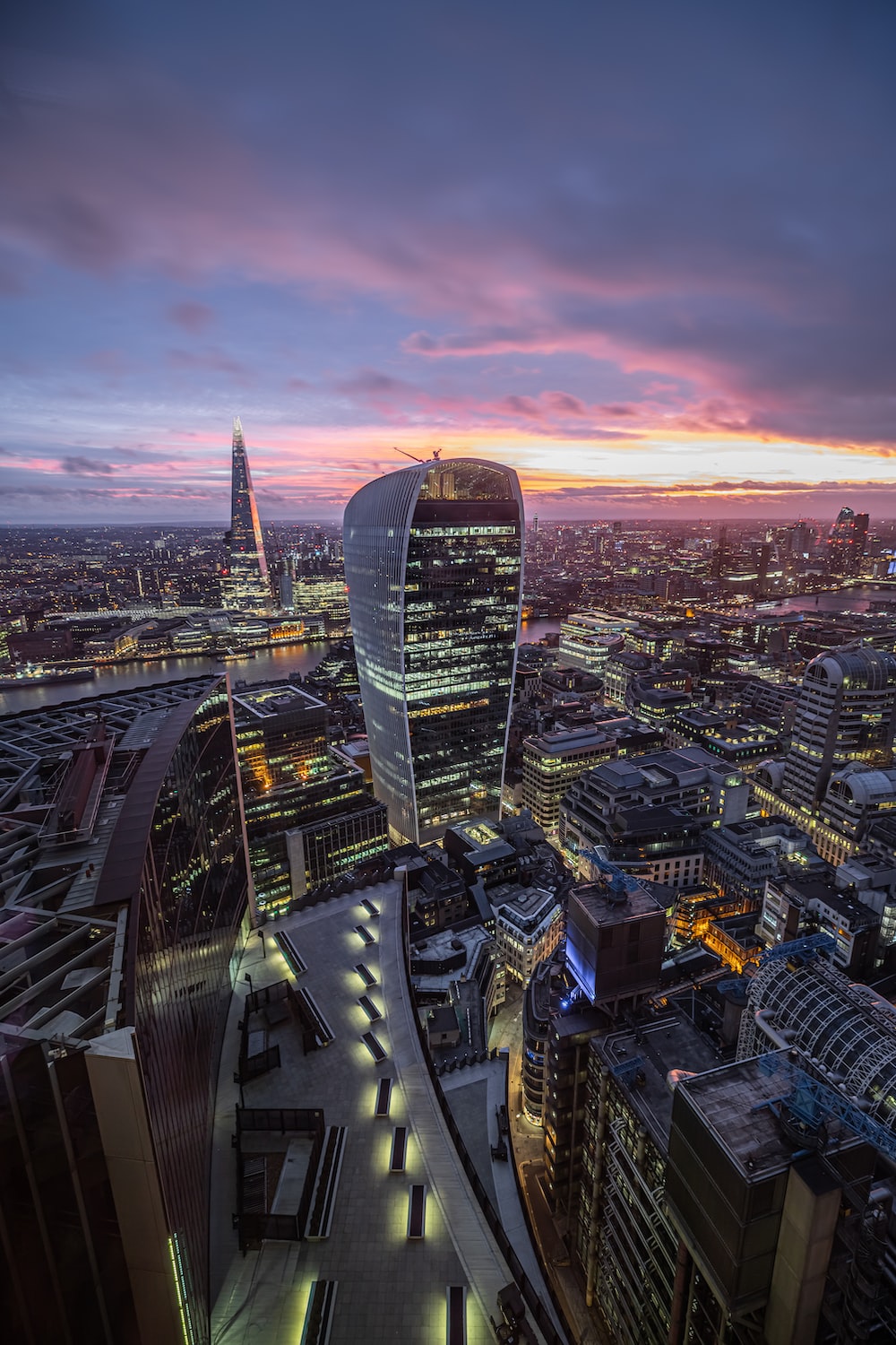 Aerial view of city buildings during sunset photo