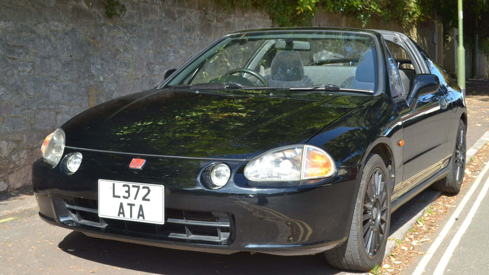 Download Stunning Honda Civic Del Sol in Action Wallpaper