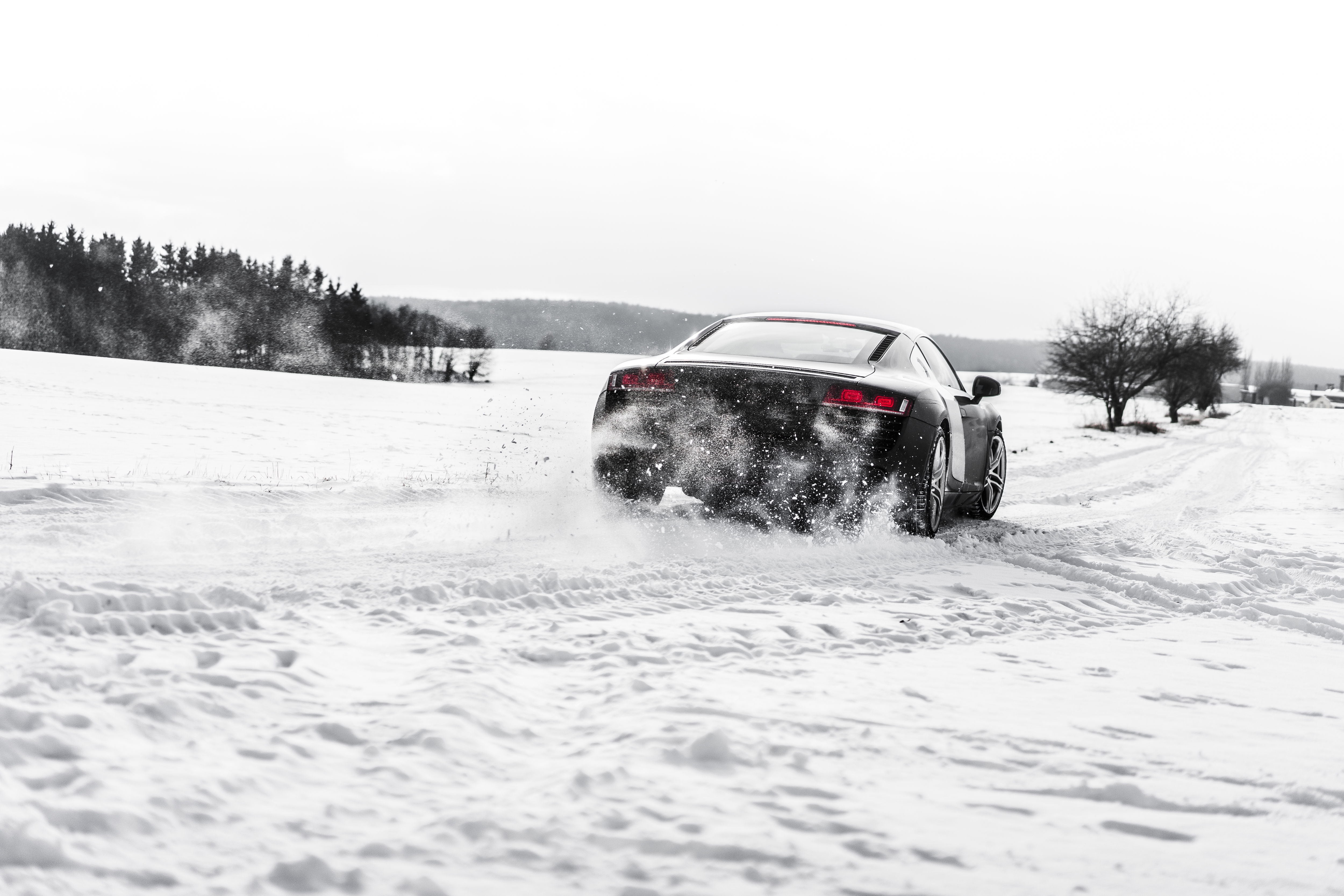 Supercar Drifting on a Snow Covered Road Free