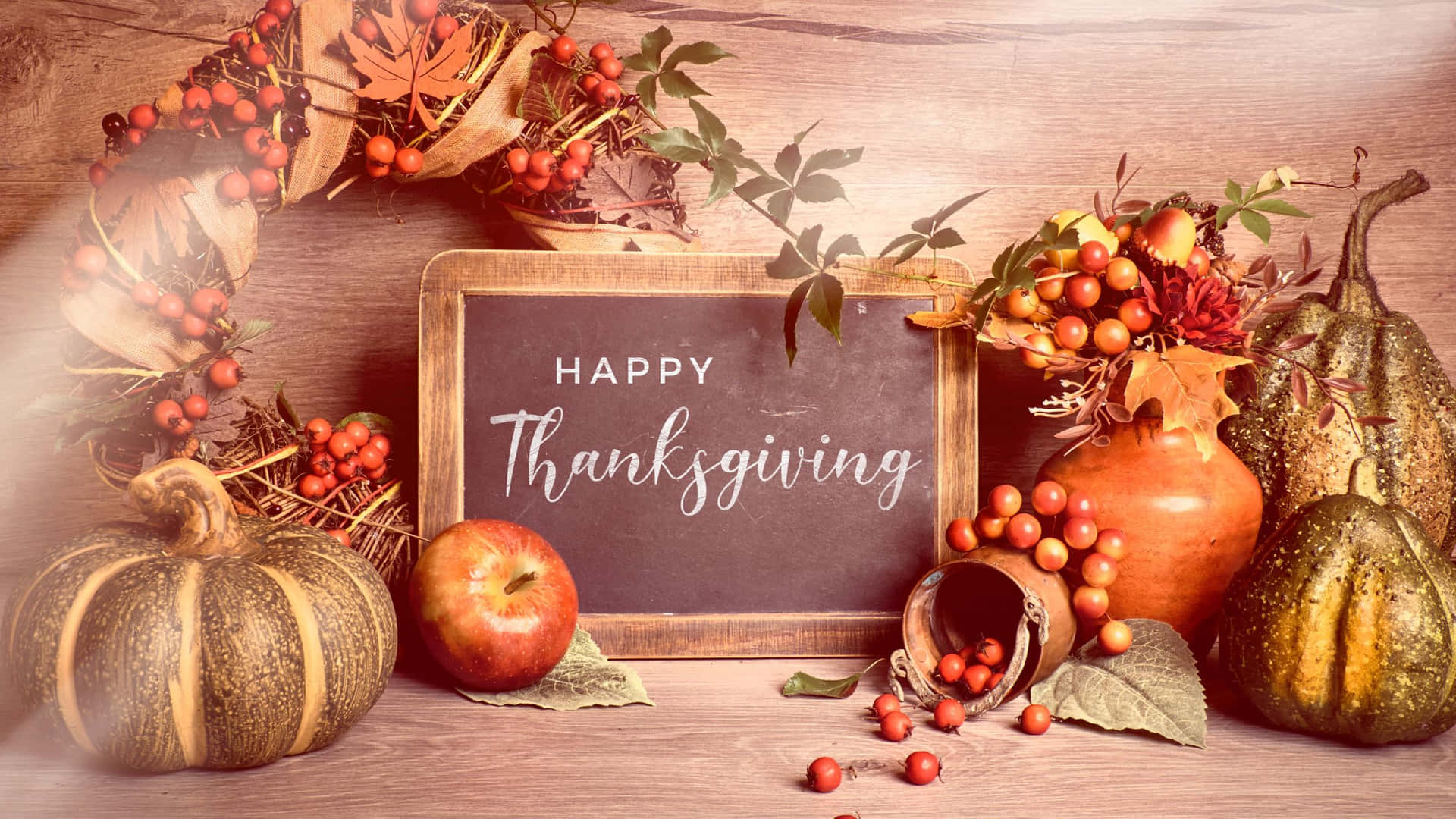 Download A beautiful Thanksgiving dinner with an autumn bouquet of leaves and fruits. Wallpaper