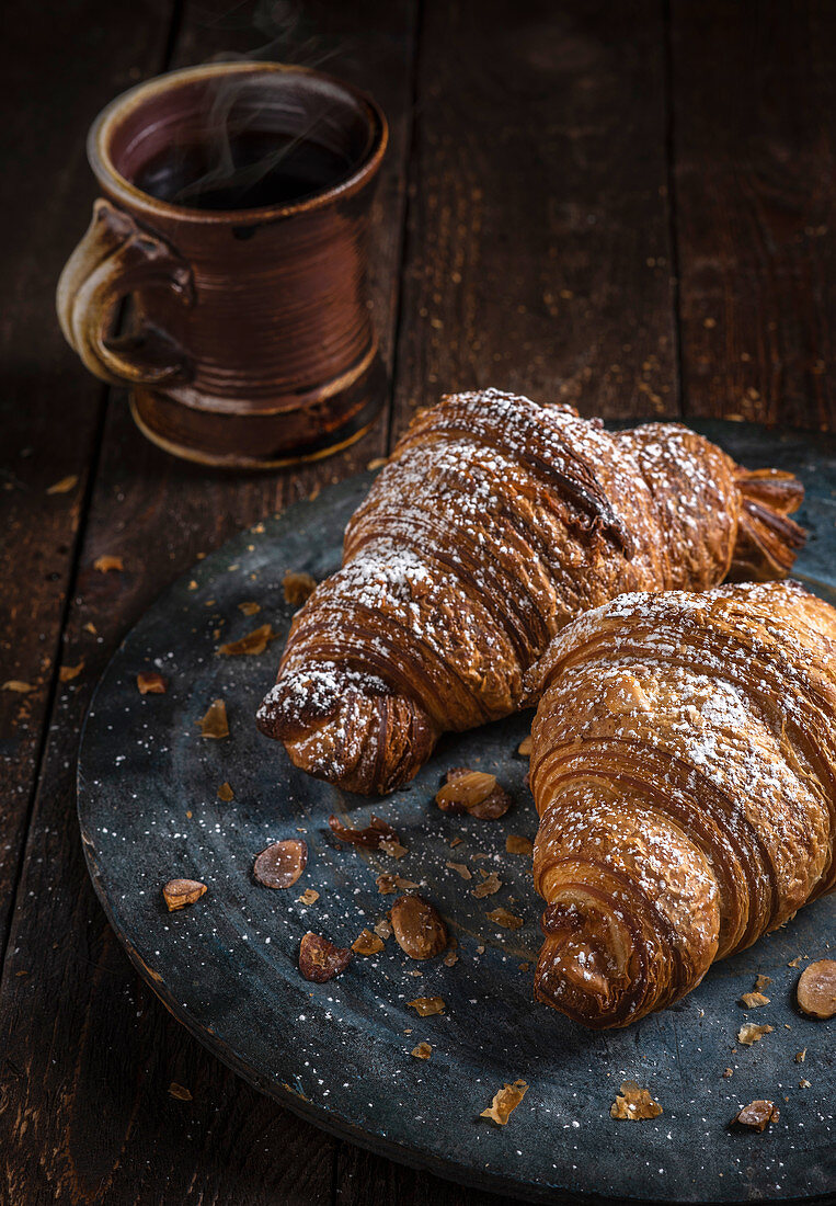 Almond croissants with powdered sugar