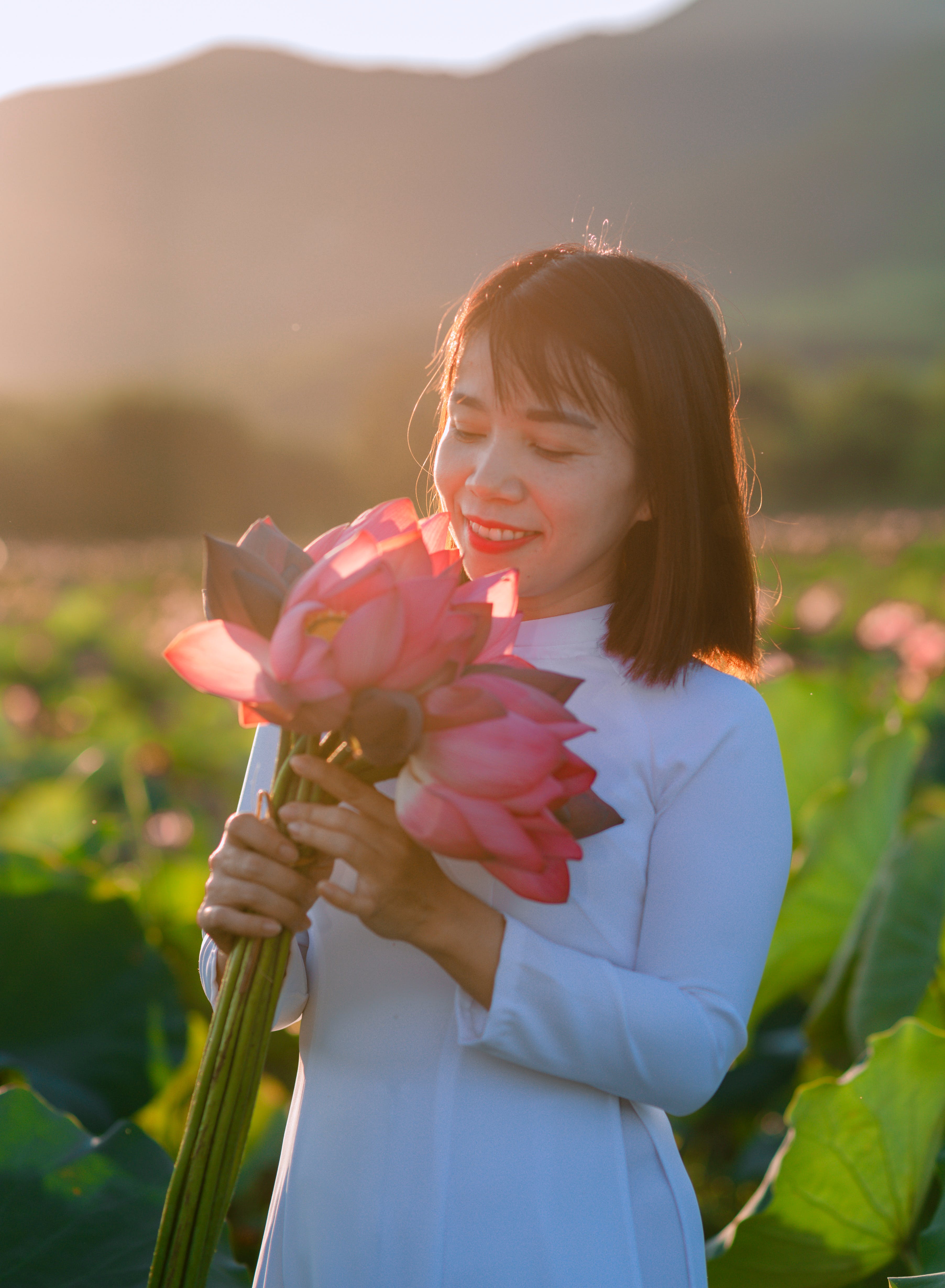 Woman Looking at Flowers · Free