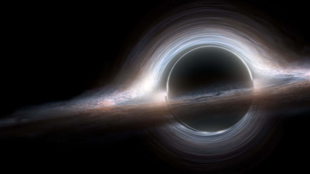 Download Marvel at the beauty of the Interstellar Black Hole Wallpaper