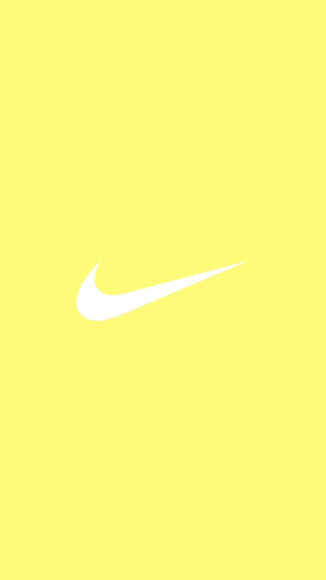 Download Nike Logo Plain Yellow Phone Wallpaper