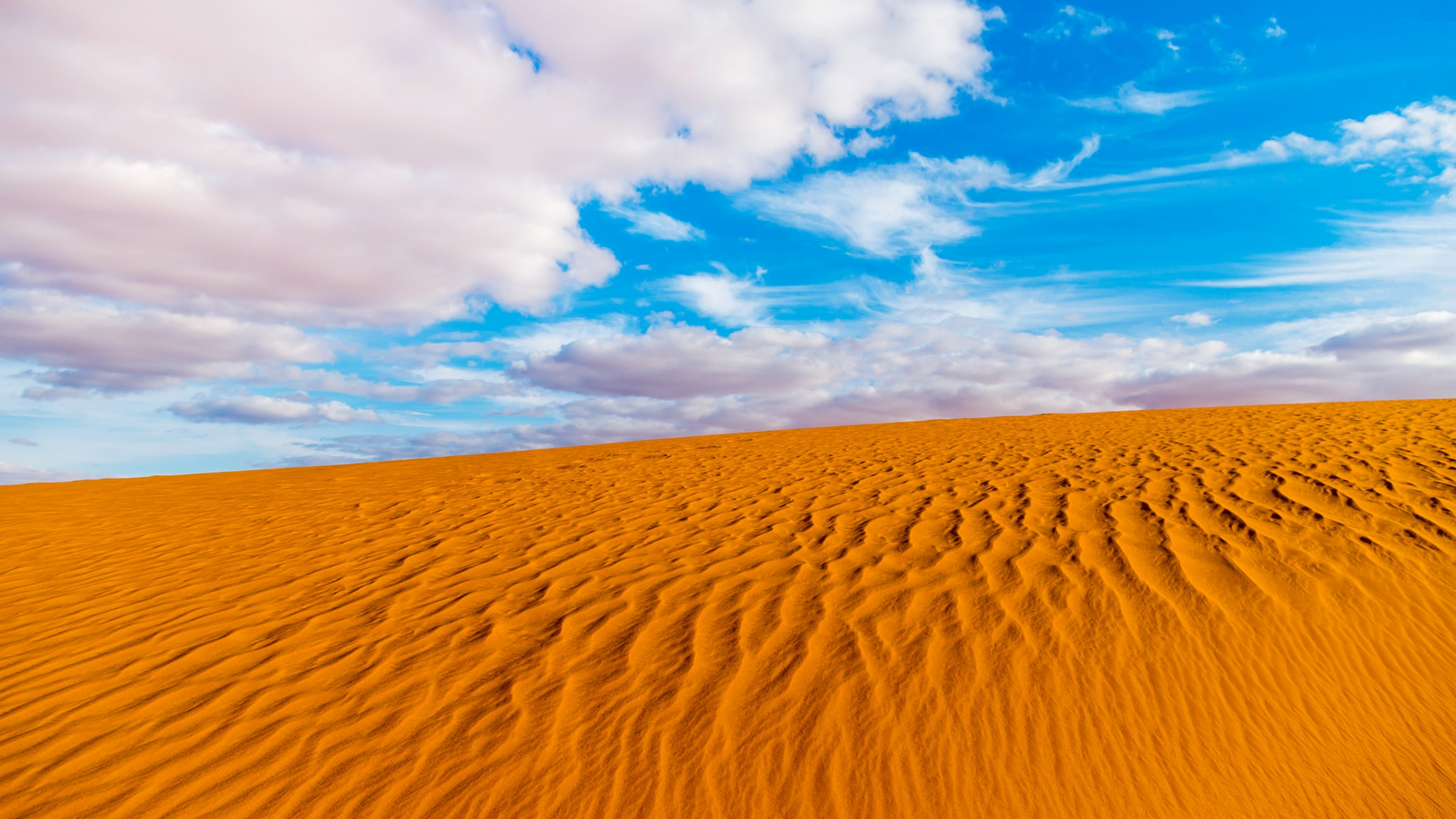Download wallpaper 3840x2160 algeria desert, sahara, sand, clouds, blue sky 4k wallpaper, uhd wallpaper, 16:9 widescreen 3840x2160 HD background, 1834