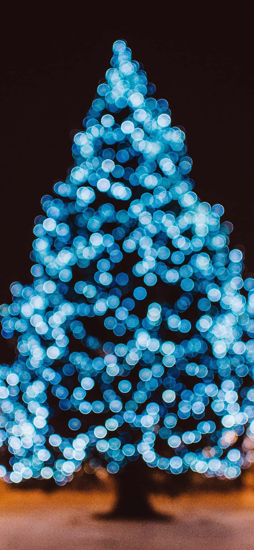 Download Blue Christmas Tree Glowing Wallpaper