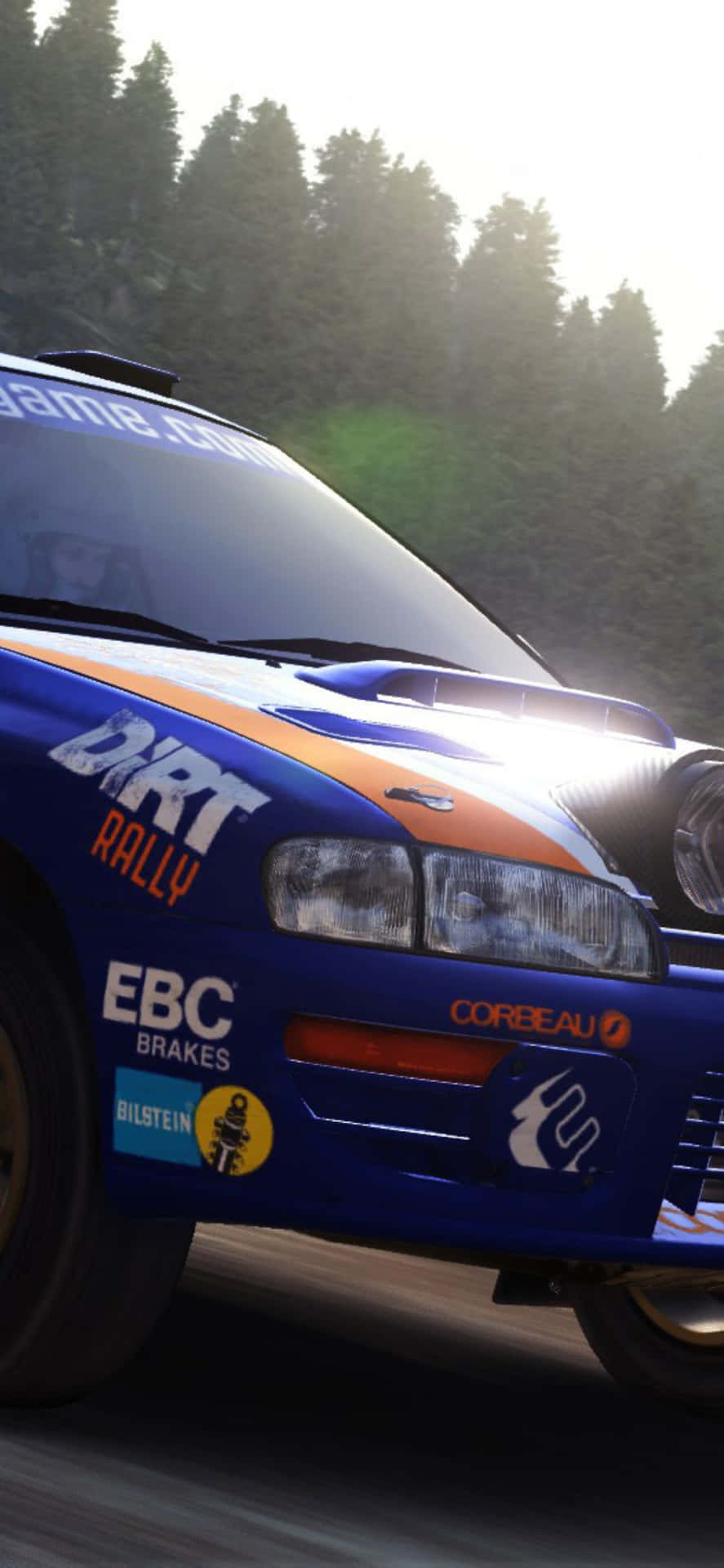 Download A Blue And Orange Rally Car Driving Down A Road
