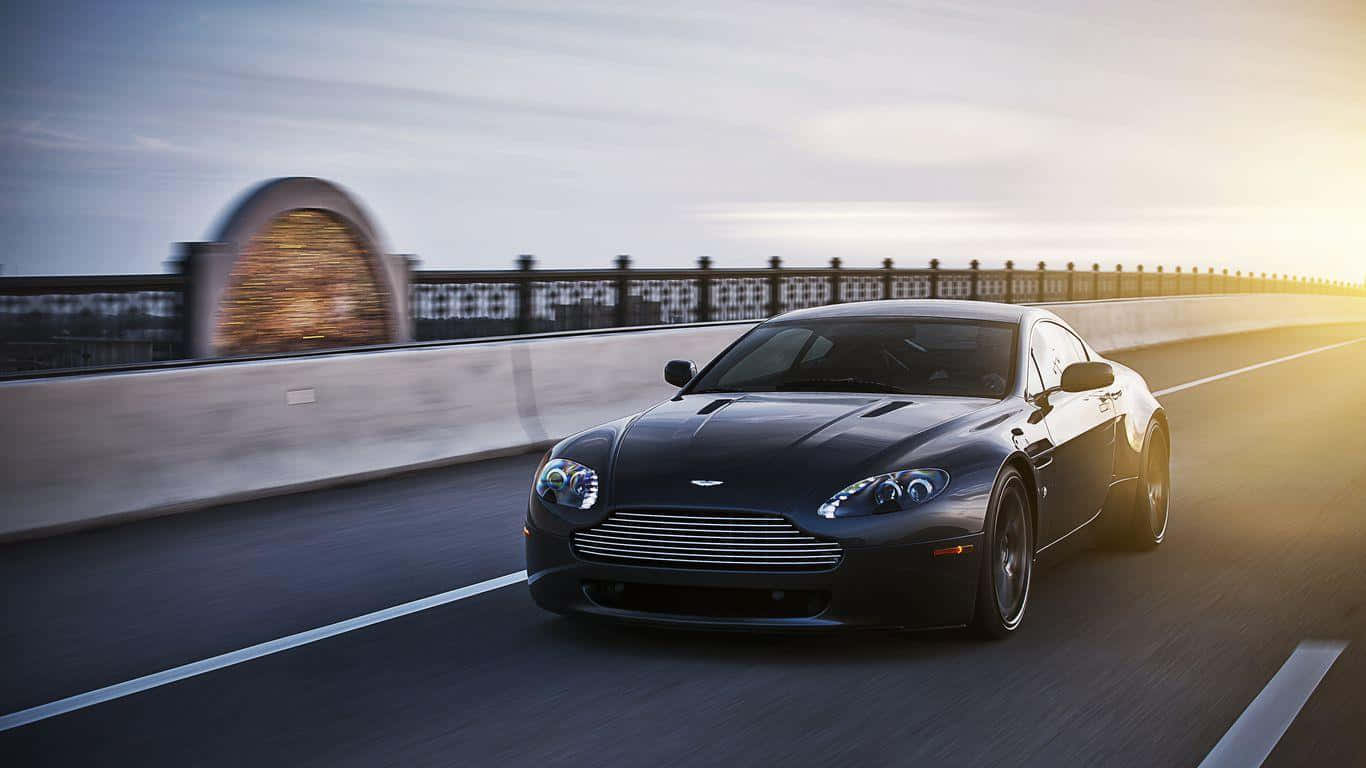 Download Aston Martin V12 Vantage & Beauty Combined Wallpaper