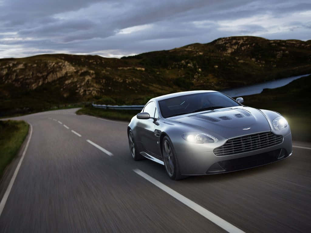 Download Aston Martin V12 Vantage: Beauty Meets Performance Wallpaper