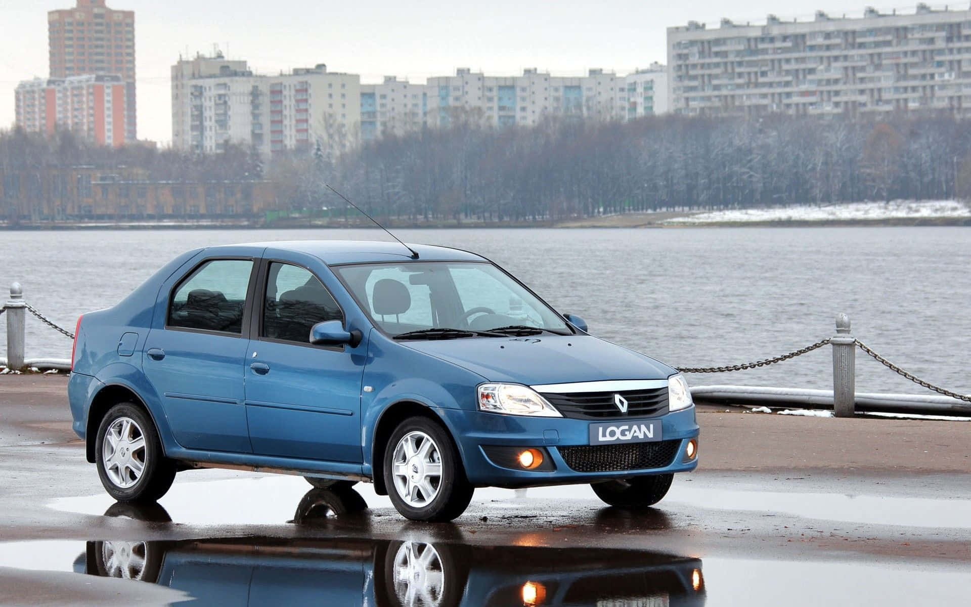 Download Stylish Dacia Logan On The Highroad Wallpaper
