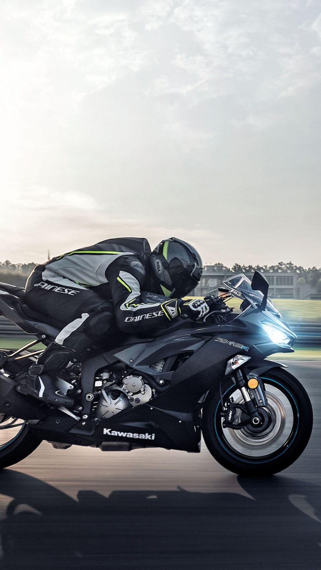 Download wallpaper: Kawasaki Ninja ZX 6R in motion 1080x1920