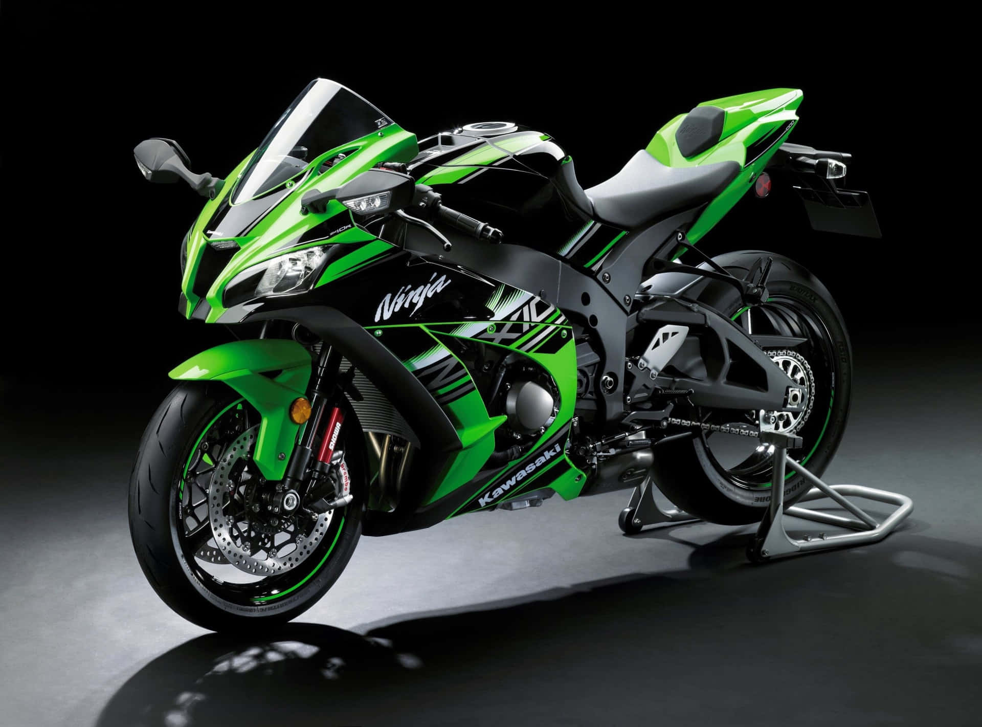 Download A Powerful Kawasaki Ninja Zx 10r Motorcycle In Action Wallpaper