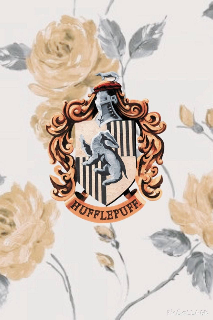 Download Represent your house with pride with this Watercolor Hufflepuff Logo Wallpaper
